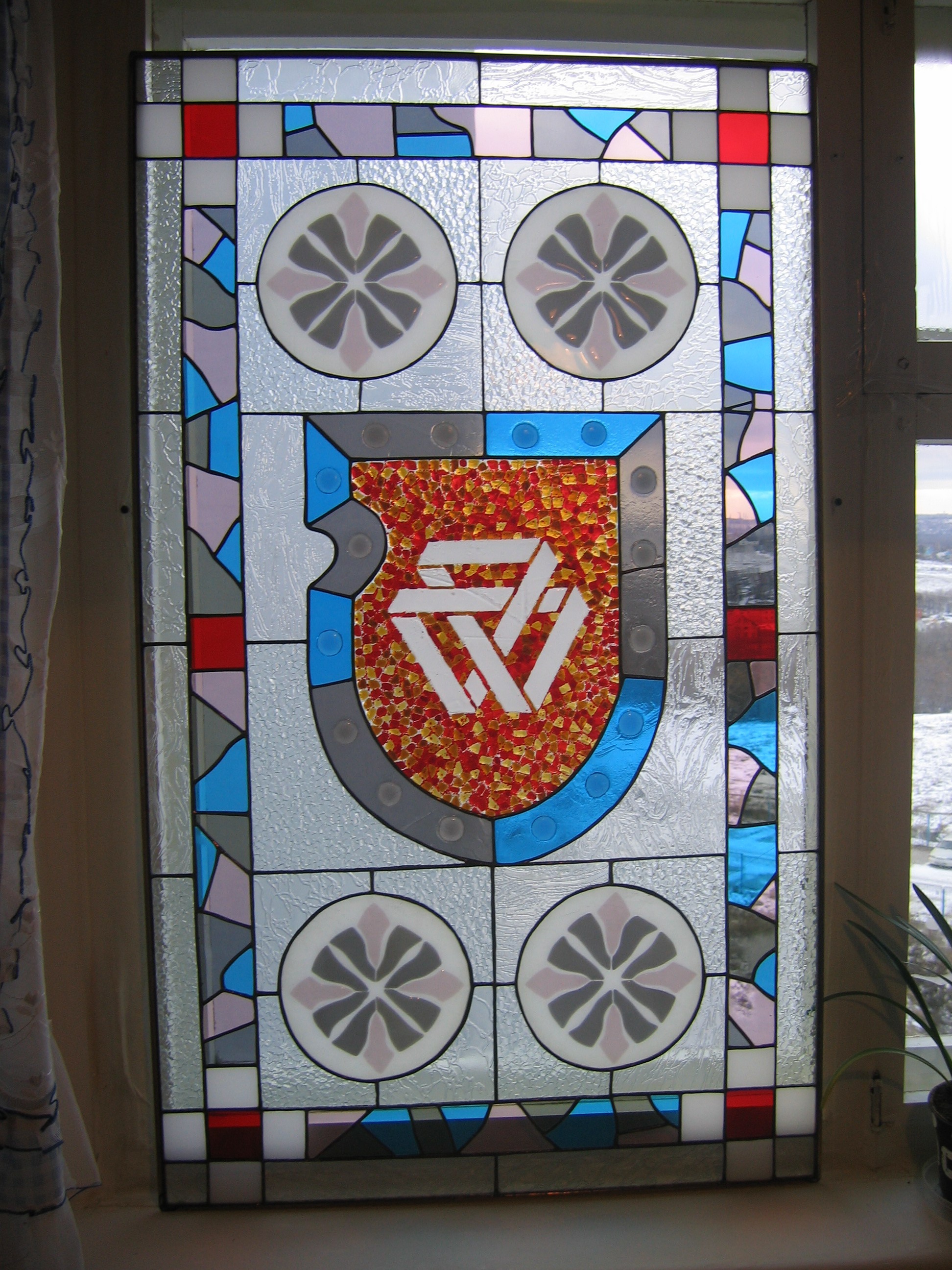 логотип фирмы"тайзер"