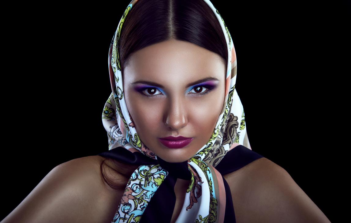 Sexy young woman in a shawl