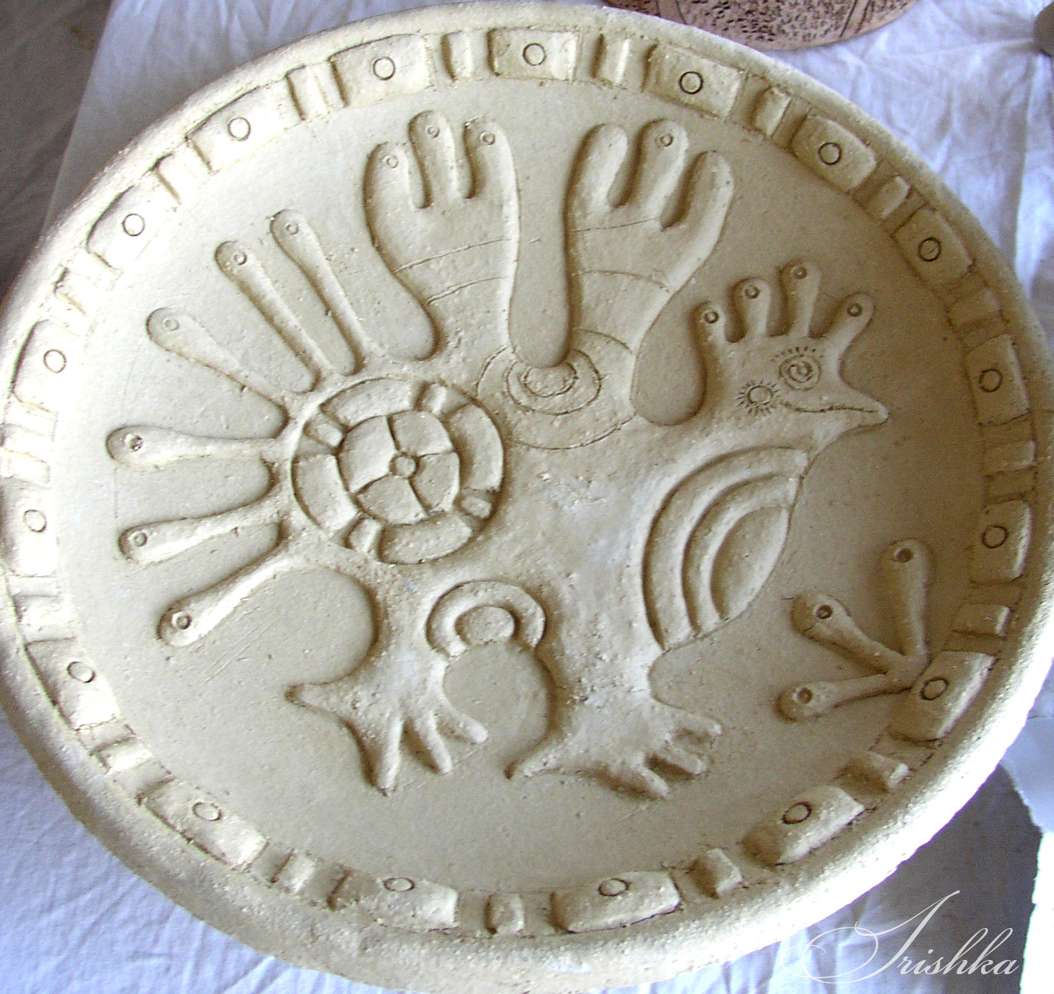 Кермаическая тарелка